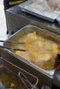 a Lots of fried chicken is deep frying