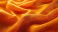 A zoomed-in shot of a fabric in a warm, hypothetical Sunset Orange, showcasing its texture and warm color, occupying the