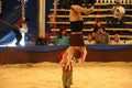 Aerial acrobat on rings and boy performer at Zoppe circus in Redwood city California