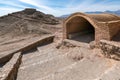 Zoroastrian Tower of Silence with stairs and tomb in the foreground, city of Yazd, Iran. Ancient persian burial site on a hot Royalty Free Stock Photo