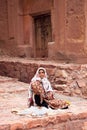 Zoroastrian women seling goods
