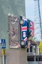 Car on the wall of the building to promote be best language school