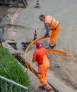 Workers at work to bury the cables of the ultra-fast network