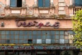 Zrenjanin, Serbia - April 29, 2023: Ruined building of an closed old department store Beograd, famous brand from 1980s in former