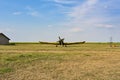 Old plane in the green field. Zrenjanin, Ecka, Serbia.
