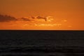 An orange sunrise in Crescent Beach