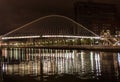 Zubizuri bridge by night in Bilbao