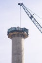 Zubri Czech Rep 1st March 2021 DISMANTLE OF CONCRETE INDUSTRIAL CHIMNEY using a crane and a little excavator. Scene with