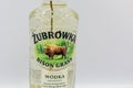 Zubrowka Bison Grass vodka bottle closeup against white bacground