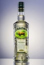 Zubrowka grass flavored vodka on gradient background.