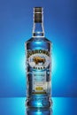 Zubrowka white vodka on blue gradient background