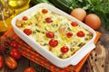 Zucchini baked with chicken, cherry tomatoes and herbs Royalty Free Stock Photo