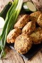 Zucchini balls with ingredients close-up on a slate board. vertical Royalty Free Stock Photo