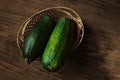 Zucchini in a basket on table Royalty Free Stock Photo