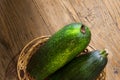 Zucchini in a basket on table Royalty Free Stock Photo