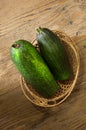 Zucchini in a basket on table Royalty Free Stock Photo