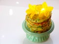 Zucchini cake decorated with cucumber flowers
