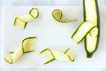 Zucchini, Courgette Ribbons and Zucchini, Courgette on Marble Board