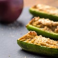 Zucchini filled with meat and stuffed in oven