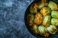 Zucchini Flowers Stuffed with Rice Pilaf for Dolma / Turkish Food in Pan Royalty Free Stock Photo