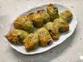 Zucchini Flowers Stuffed with Rice Pilaf for Dolma / Turkish Food Served with Plate Royalty Free Stock Photo