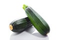 Zucchini or green marrow squash isolated on white Royalty Free Stock Photo