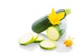 Zucchini or green marrow squash with green leaves and flowers isolated Royalty Free Stock Photo