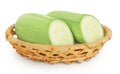 zucchini or marrow in a wicker basket isolated on white background with full depth of field Royalty Free Stock Photo
