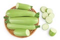 zucchini or marrow in a wicker basket isolated on white background with full depth of field. Top view. Flat lay Royalty Free Stock Photo