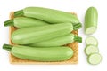 zucchini or marrow in a wicker basket isolated on white background with full depth of field. Top view. Flat lay Royalty Free Stock Photo