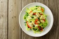 Zucchini noodle dish overhead view on wood