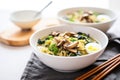 zucchini noodle ramen with boiled egg and mushrooms in a bowl