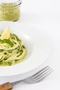 Zucchini noodles with pesto sauce isolated on white background Royalty Free Stock Photo