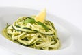 Zucchini noodles with pesto sauce isolated on white background Royalty Free Stock Photo