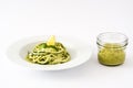 Zucchini noodles with pesto sauce on white background Royalty Free Stock Photo