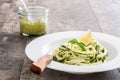 Zucchini noodles with pesto sauce on wooden table Royalty Free Stock Photo