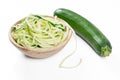 Zucchini noodles in a rustic wooden bowl isolated Royalty Free Stock Photo