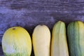 Zucchini ordinary. Fresh vegetables. On an old wooden table. View from above Royalty Free Stock Photo