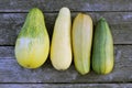 Zucchini ordinary. Fresh vegetables. On an old wooden table. View from above Royalty Free Stock Photo
