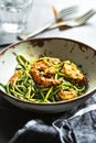 Zucchini pasta with Prawns in Basil Pesto sauce Royalty Free Stock Photo