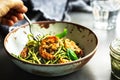 Zucchini pasta with Prawns in Basil Pesto sauce Royalty Free Stock Photo