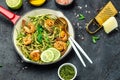 Zucchini pasta with shrimps and pesto sauce in pan. keto low carb diet. banner, menu, recipe place for text, top view Royalty Free Stock Photo