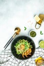 zucchini pasta with shrimps and pesto sauce in pan. keto low carb diet. banner, menu, recipe place for text, top view Royalty Free Stock Photo