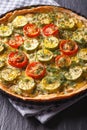 Zucchini quiche homemade closeup. Vertical