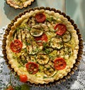 Zucchini quiche on wooden table