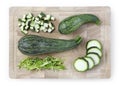 Zucchini sliced and chopped on wooden cutting board food top vie