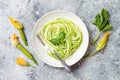 Zucchini spaghetti with basil. Vegetarian vegetable low carb pasta. Zucchini noodles or zoodles Royalty Free Stock Photo