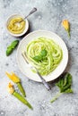 Zucchini spaghetti with basil. Vegetarian vegetable low carb pasta. Zucchini noodles or zoodles Royalty Free Stock Photo