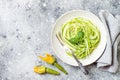 Zucchini spaghetti with basil. Vegetarian vegetable low carb pasta. Zucchini noodles or zoodles Royalty Free Stock Photo