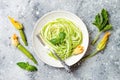 Zucchini spaghetti with basil. Vegetarian vegetable low carb pasta. Zucchini noodles or zoodles Royalty Free Stock Photo
